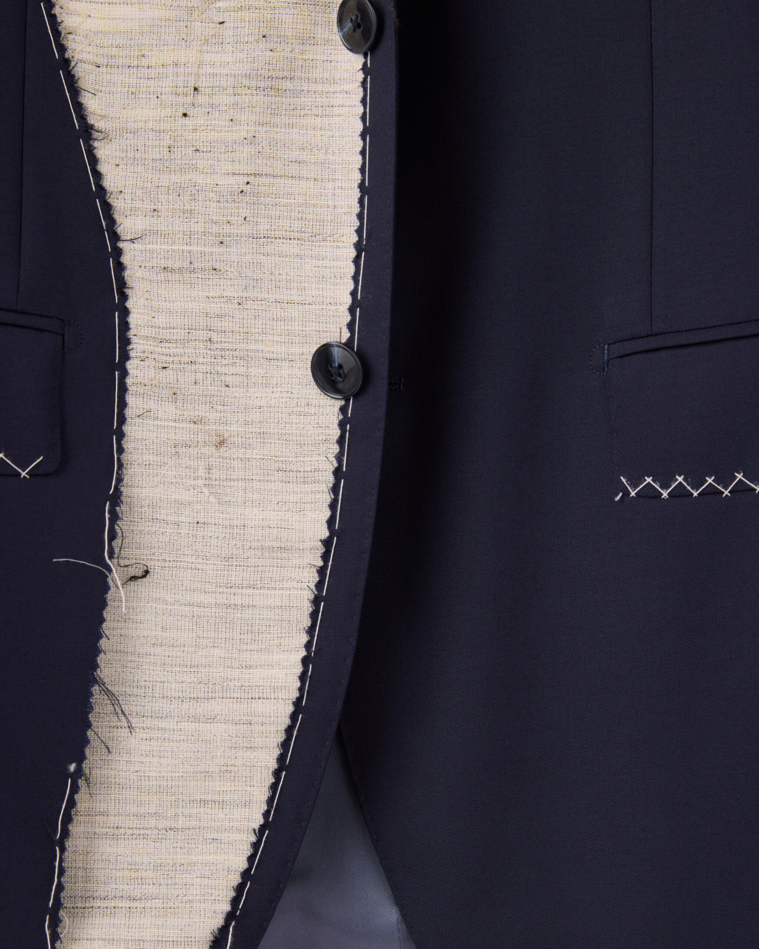 Bespoke jacket canvas construction with hand stitching